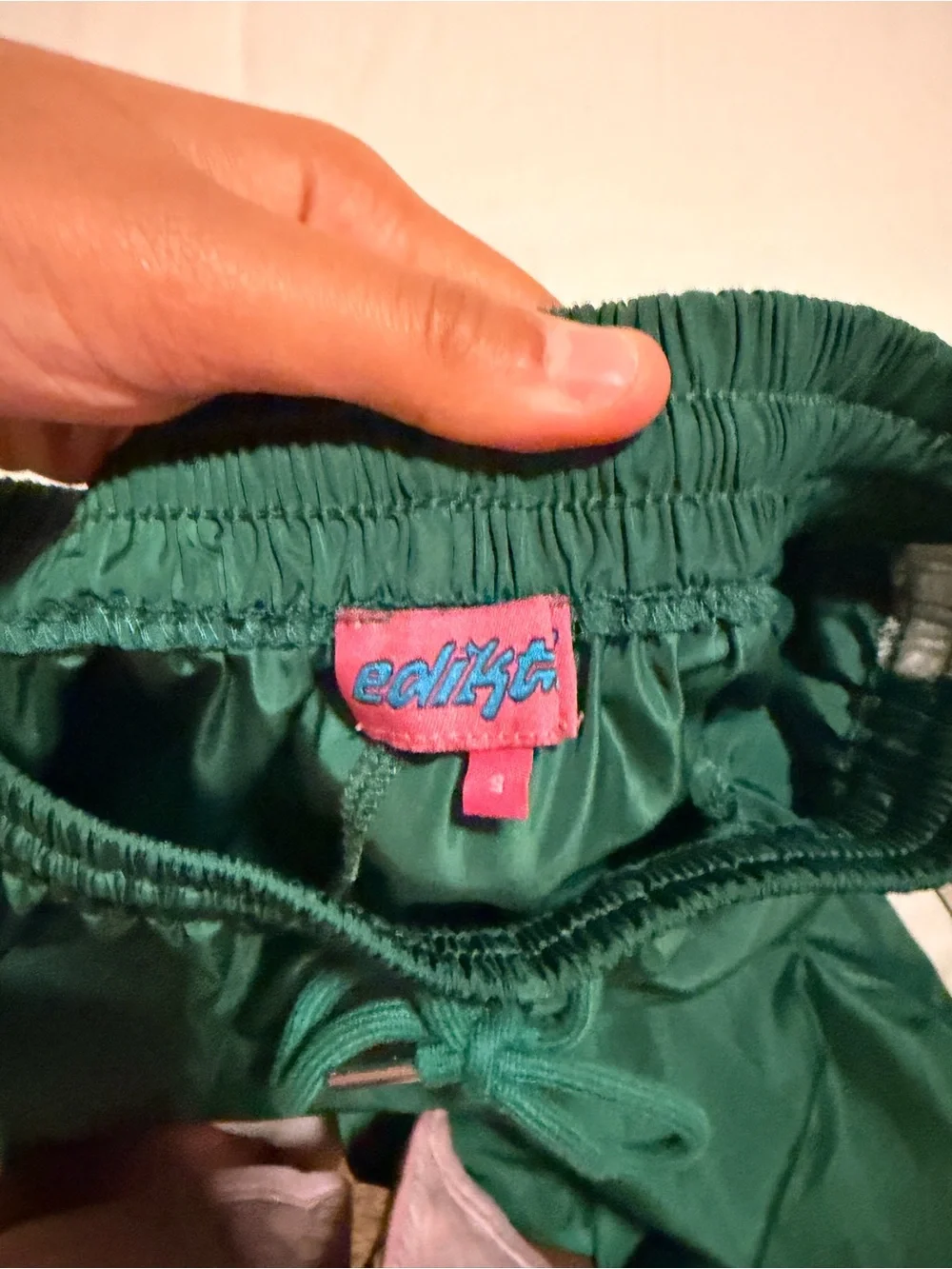 Edikted Emerald Green Track Pants with White Tag Accent